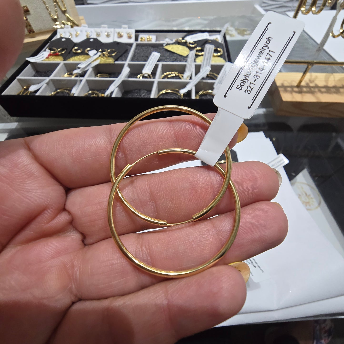 Argollas lisas en Oro18kilates italiano amarillo de 4 cm de diametro de 2.3 gramos