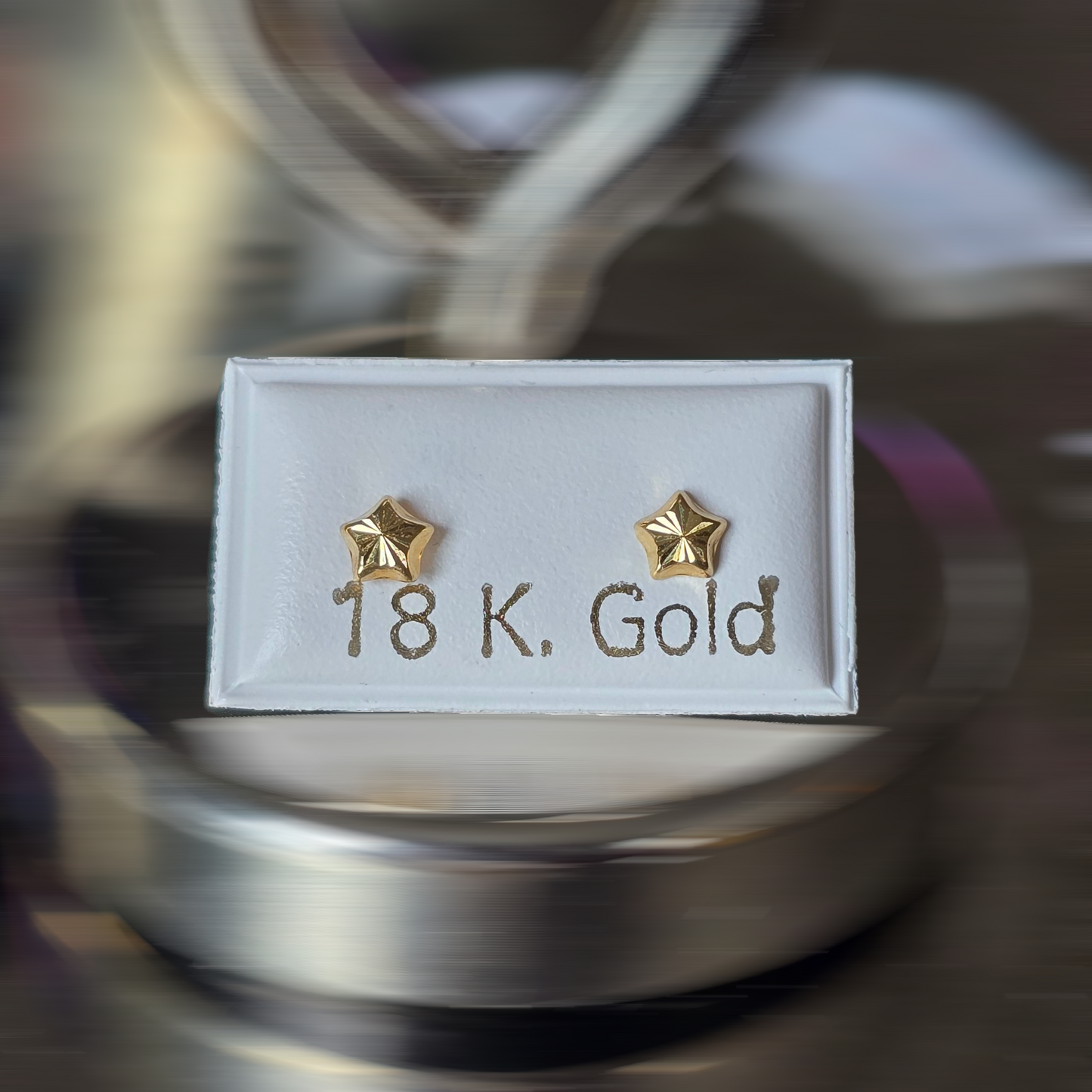 Zarcillos estrella diamantada tapa de rosca de seguridad de 0.4 gramos en Oro18kilates italiano amarillo