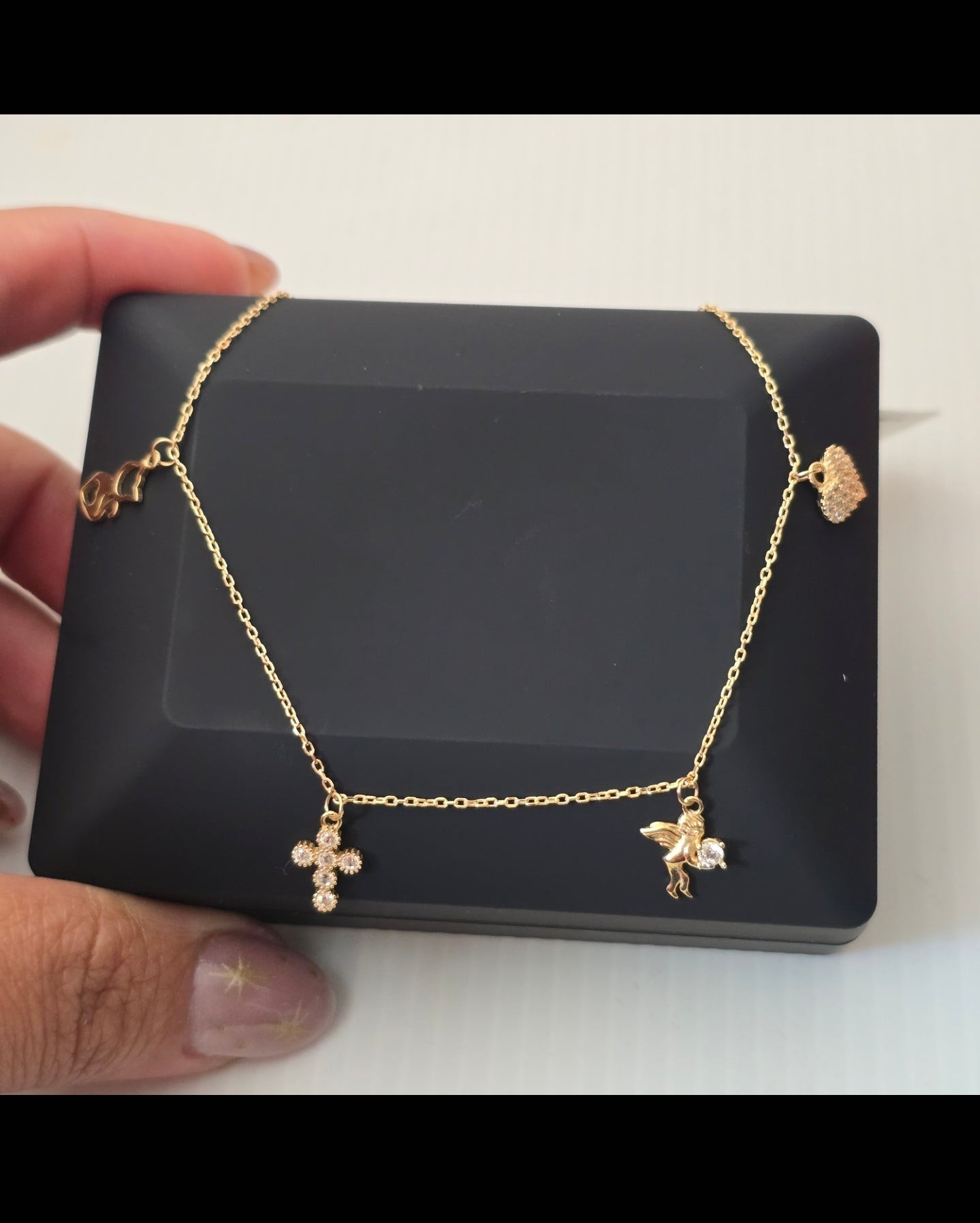 Tobillera dijes varios de 22 cm extensible en Oro18kilates italiano amarillo de 3.2 gramos