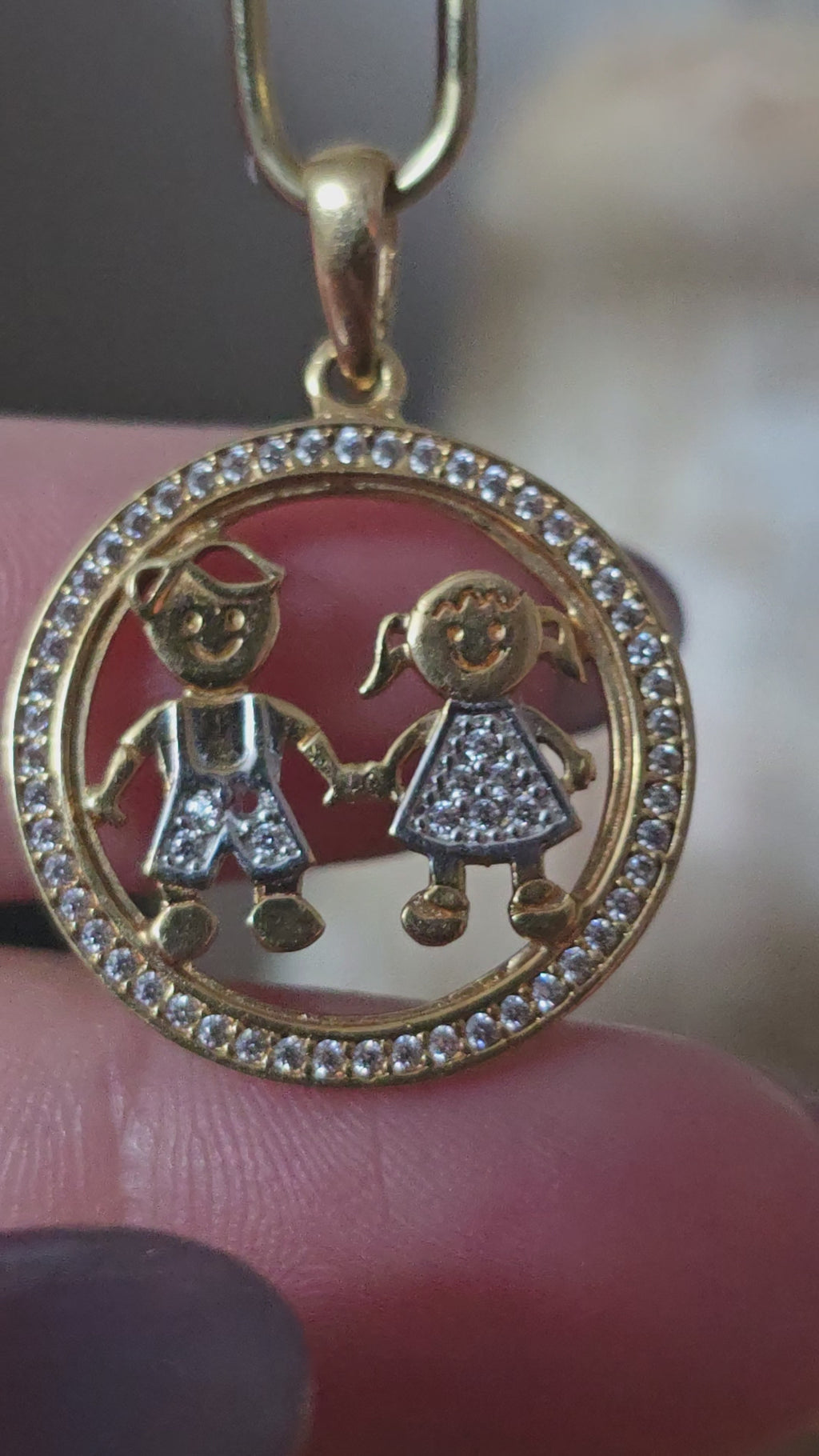 Children's couple pendant in 18karat Italian yellow and white gold with white zircons