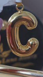 Letter charms available in the letters M N L J C M