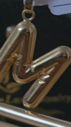 Letter charms available in the letters M N L J C M