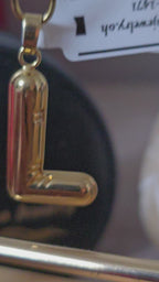 Letter charms available in the letters M N L J C M