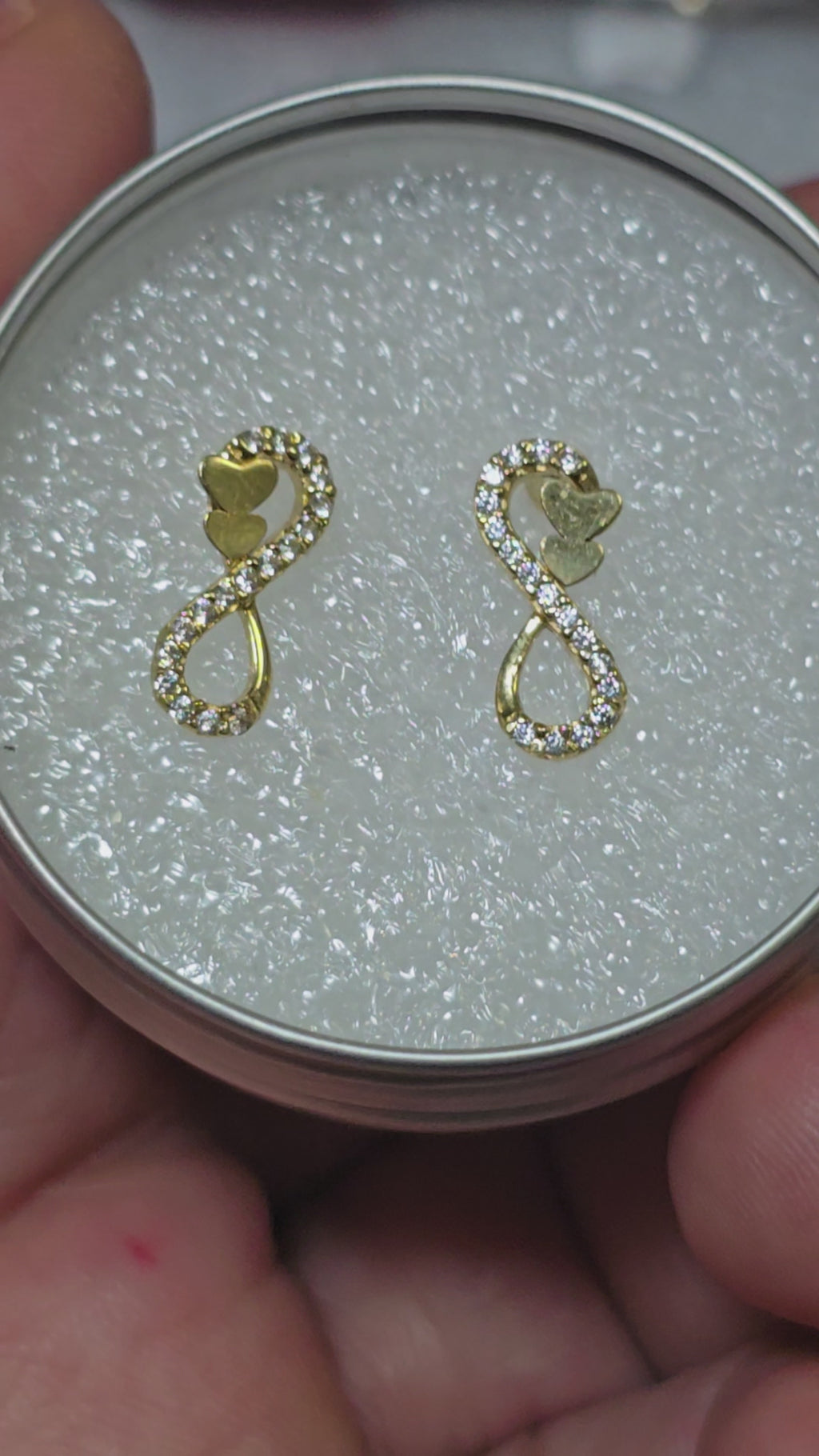 Infinity earrings with butterfly caps and white zircons in 18-karat Italian gold, 1.6