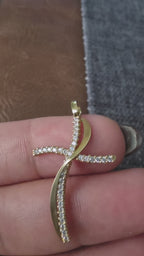 Wave cross pendant – solid 18k gold