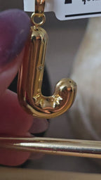 Letter charms available in the letters M N L J C M