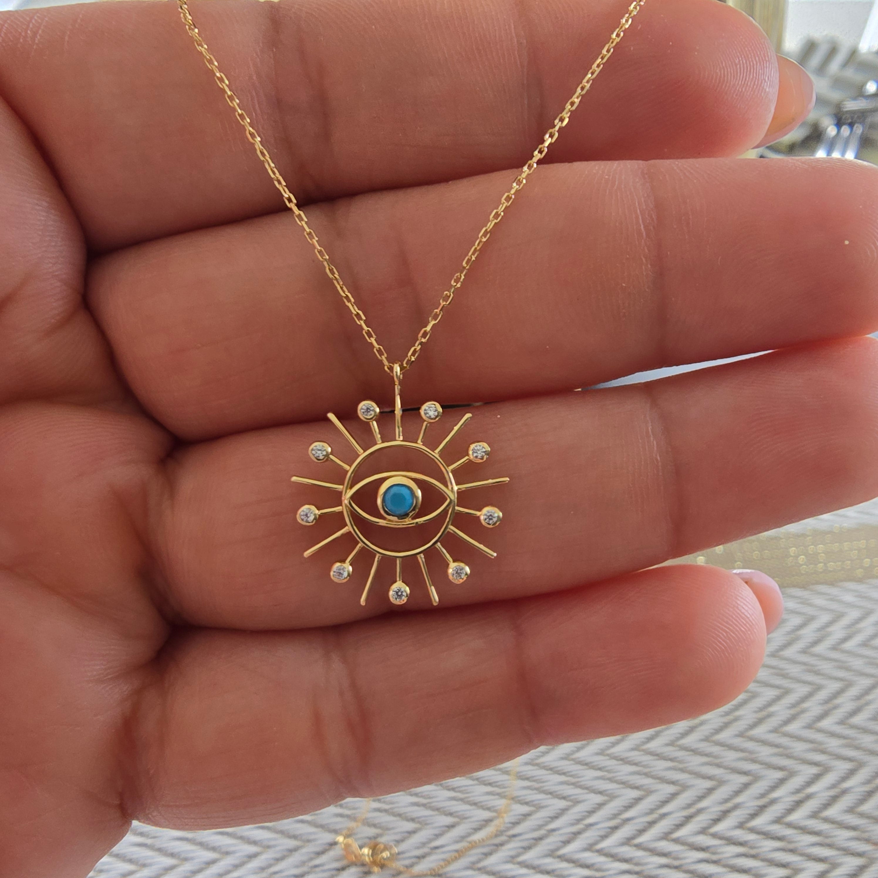Set of 45cm extendable sun and evil eye chain in 18karat Italian yellow gold, 1.6 grams