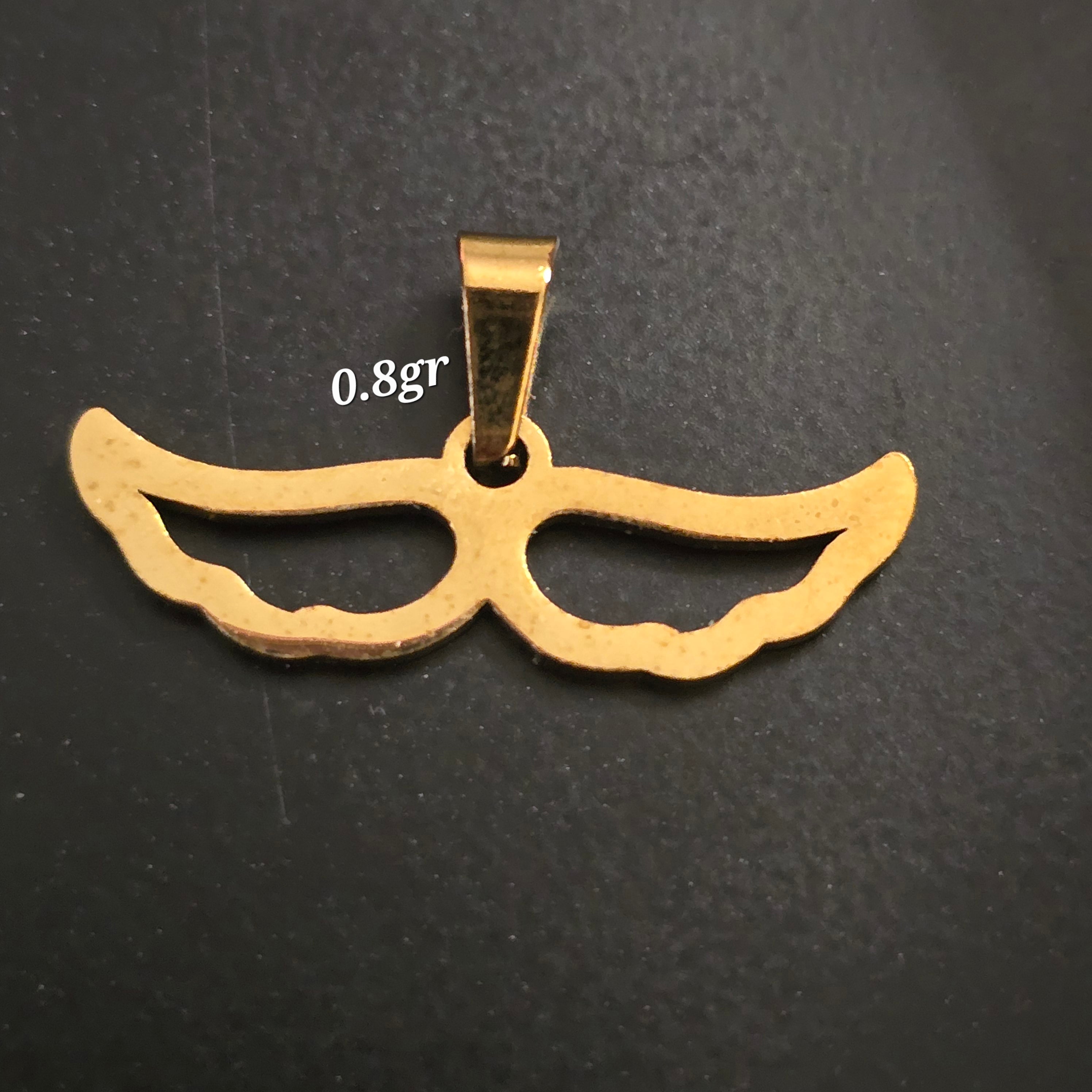 I added golden wings in 0.9 grams of 18-karat Italian yellow gold