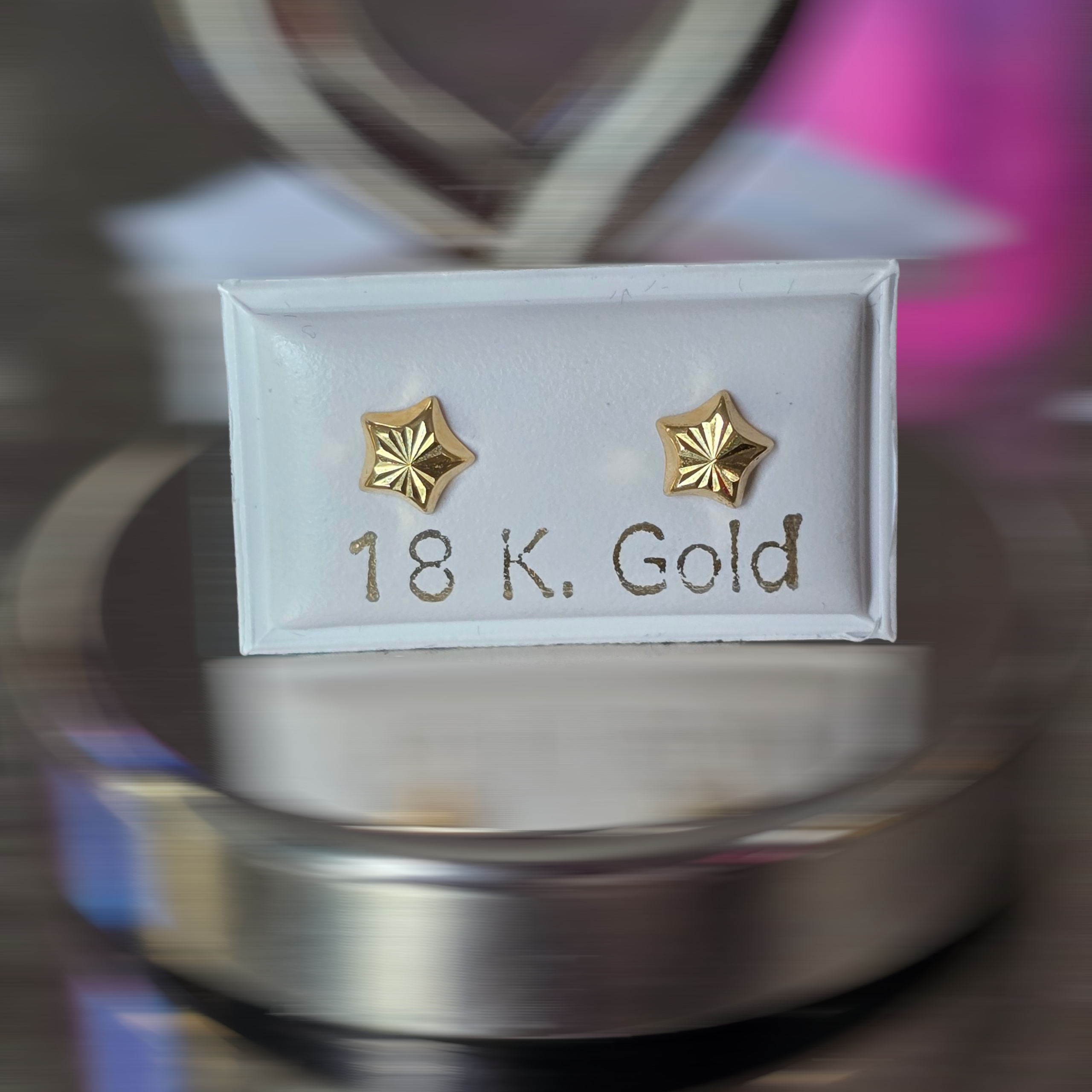 Diamond-cut star earrings with safety screw-on caps, 0.5 grams, in 18-karat Italian yellow gold