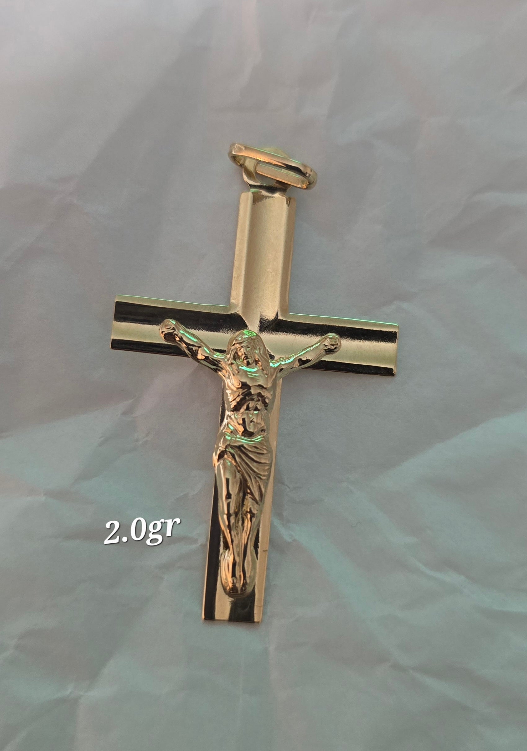 Counted pendant of Jesus Christ in 18karat Italian yellow gold, 2 grams