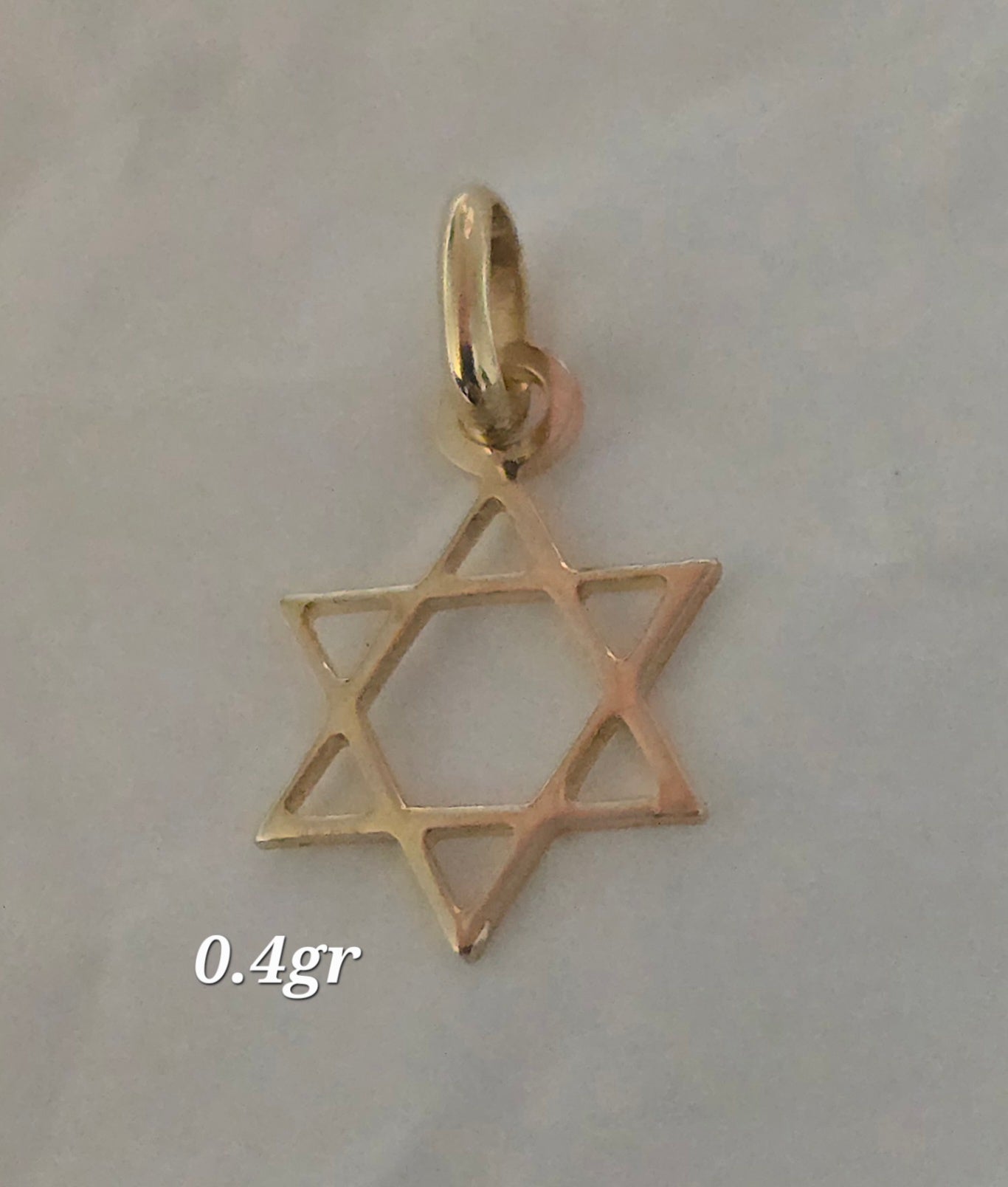 Mini Star of David pendant in 18karat Italian yellow gold, 0.4 grams
