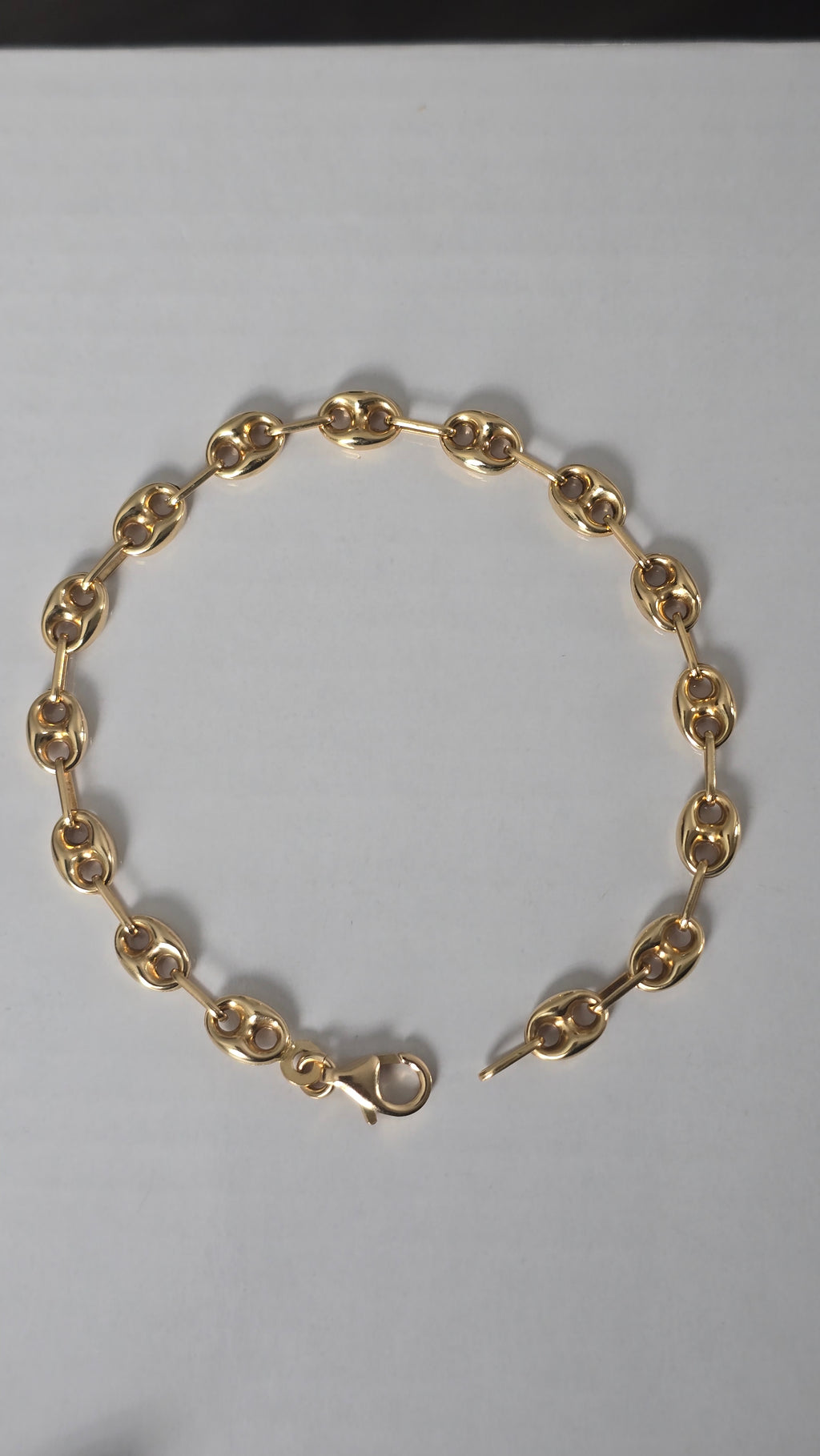 Pulsera tejida Gucci