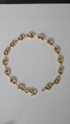 Pulsera tejida Gucci
