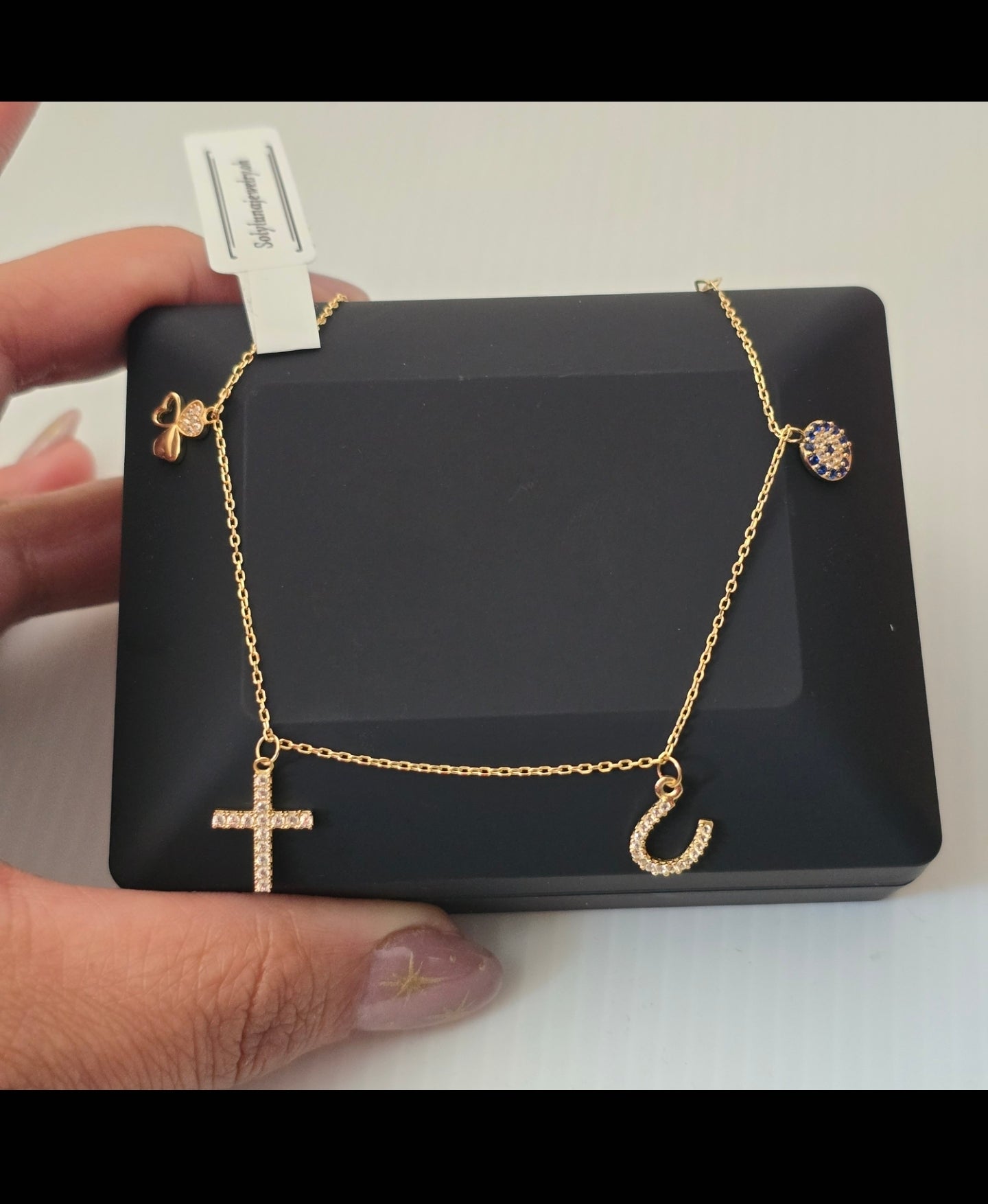 Tobillera de dijes varios de 22 cm   extensible en Oro18kilates italiano amarillo de 3.4gramos