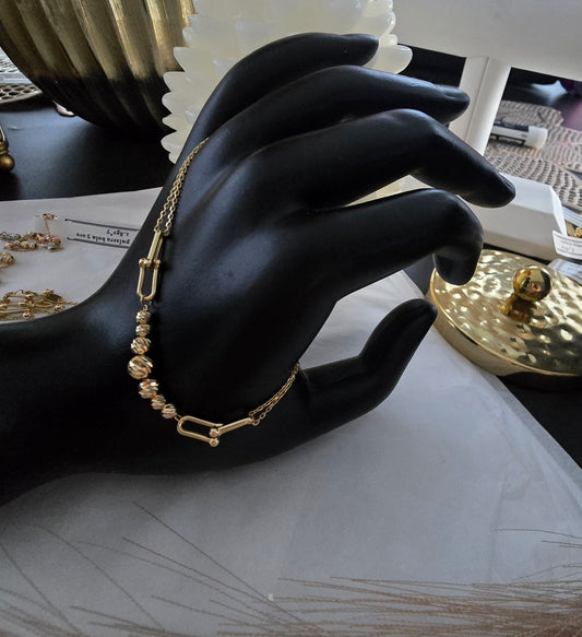 Pulsera bola tiffanny con bolas diamantadas en Oro18kilates italiano de 18 cm y 2.5gramos