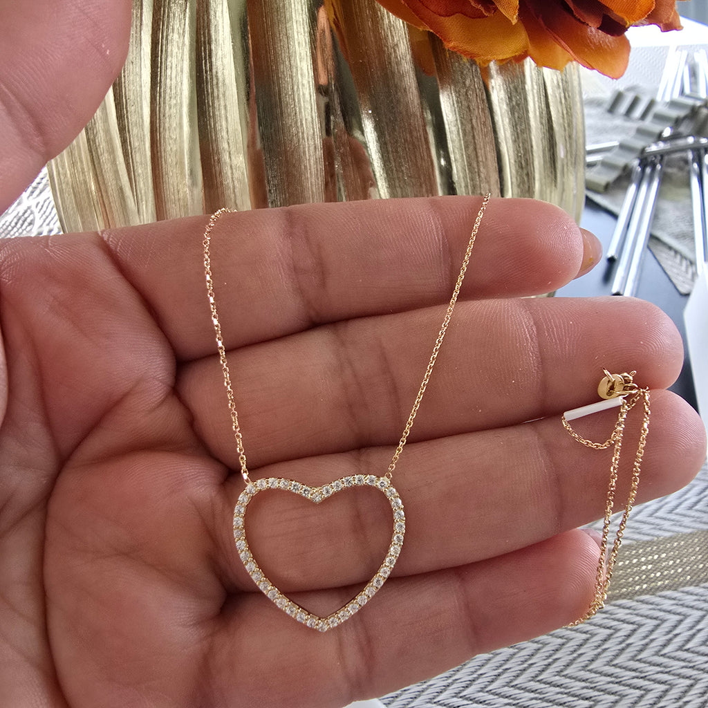 Large heart set with white zircons, 45cm extendable, in 18karat Italian yellow gold, 2.5 grams