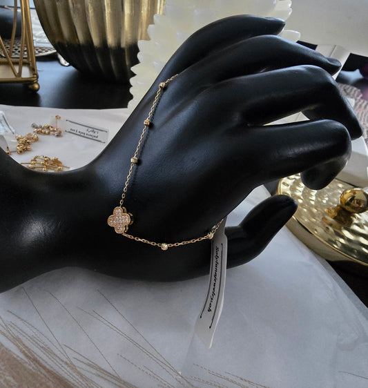 Pulsera  trebol reversible en Oro18kilates italiano amarillo de 18 cm diametro de 2 gramos