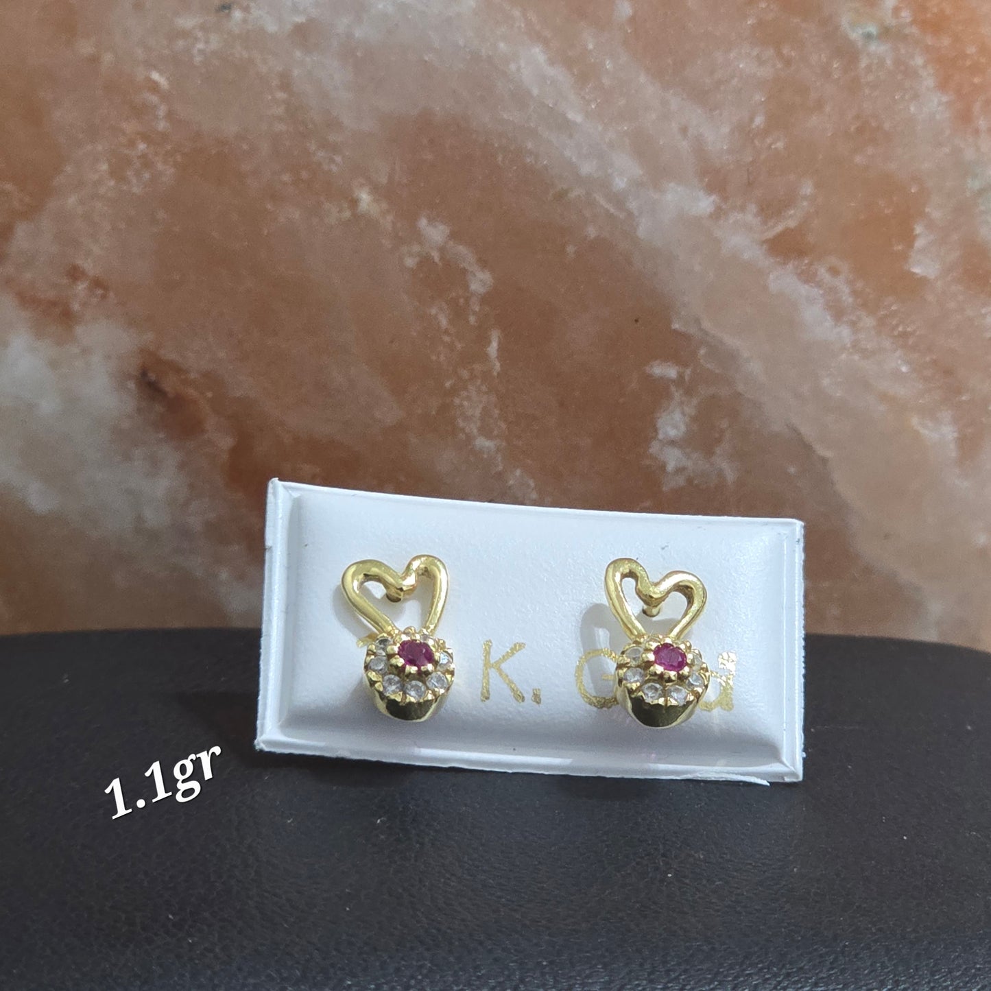 Zarcillos de mariposa con zircon fucsia de 1.1gr