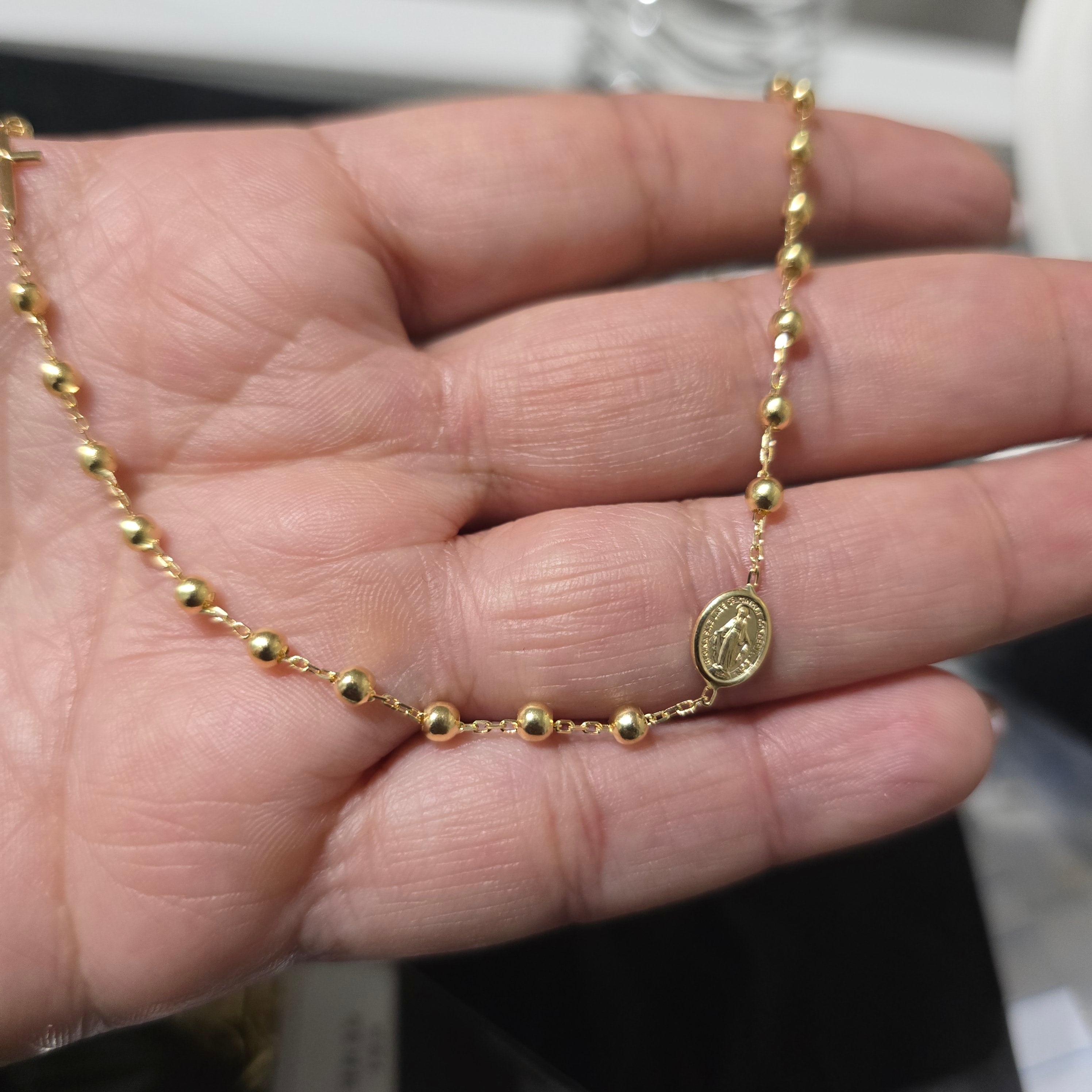 Lady's rosary, smooth bead, in 18-karat Italian yellow gold, 45 cm long with extension, weighing 4.8 grams