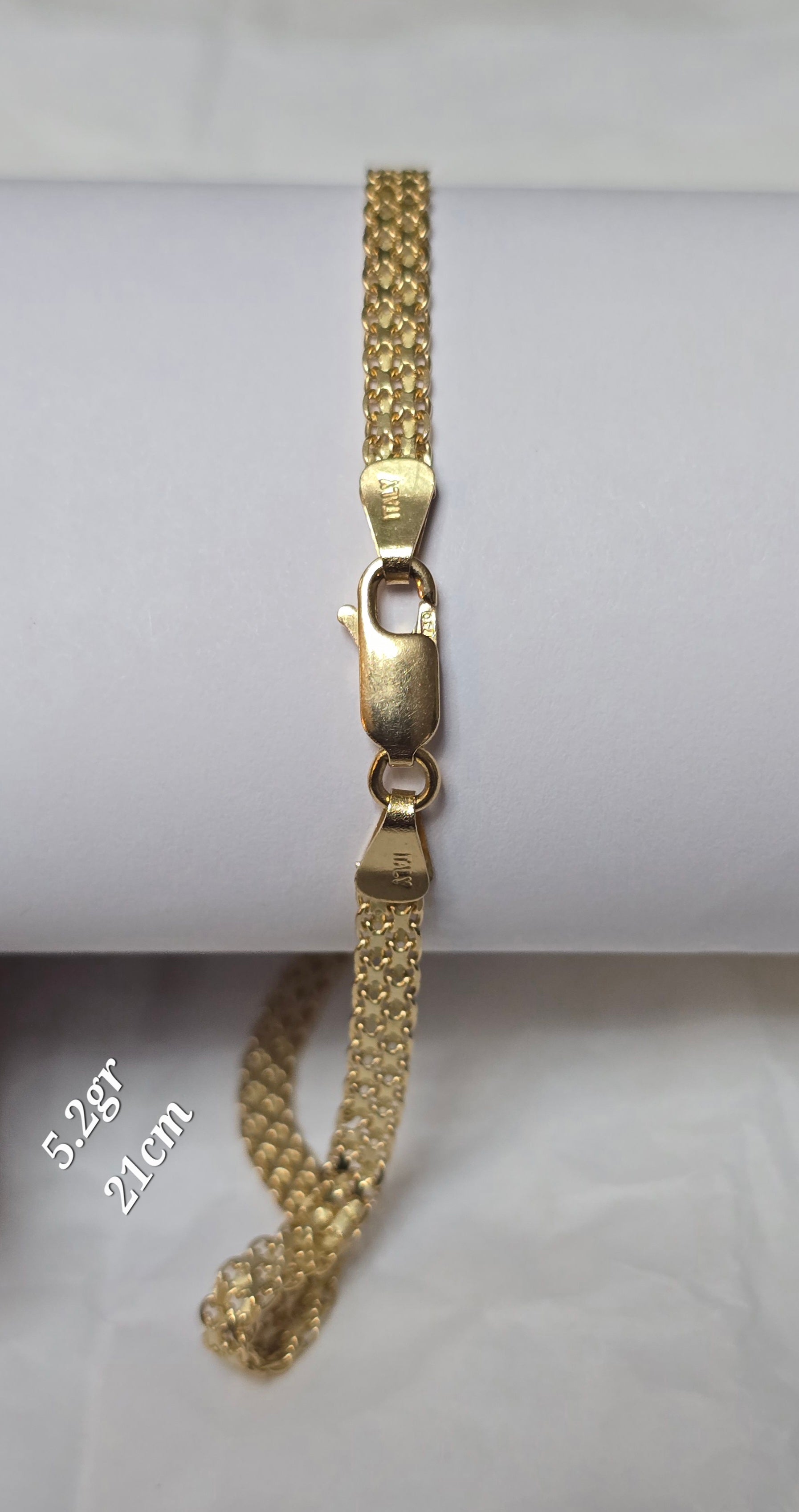 Chinese woven bracelet in 18-karat Italian yellow gold, 21 cm, 5.2 grams