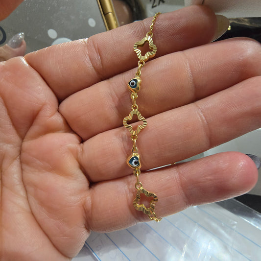 Pulsera dama ojo turco trebol en Oro18kilates italiano amarillo ajustable de 2.4 gramos