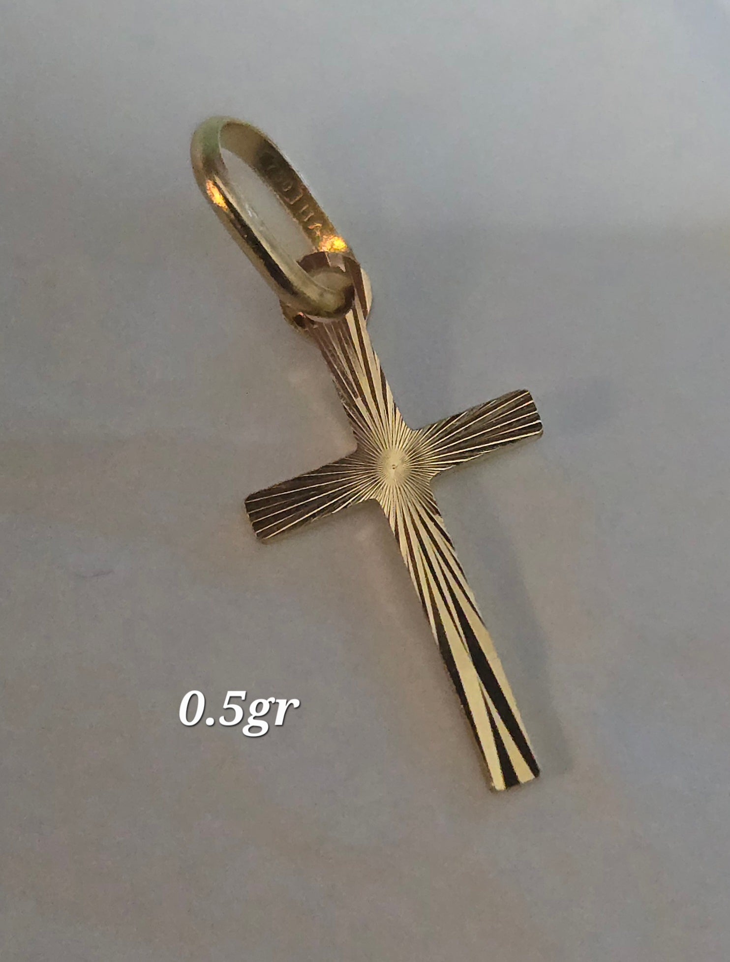 I said cross weighing 0.5g
