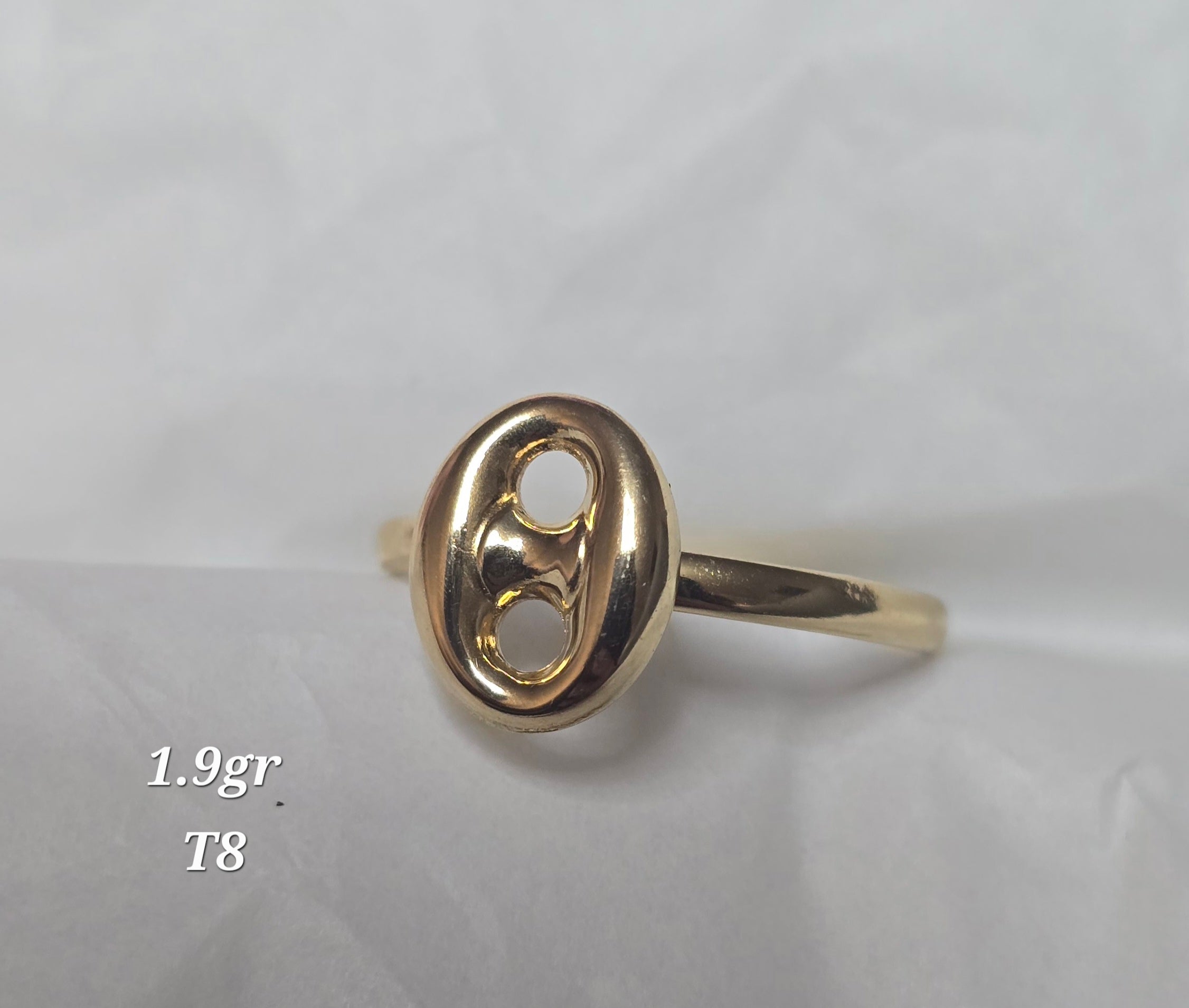 Gold Gucci ring, size eight, 1.9