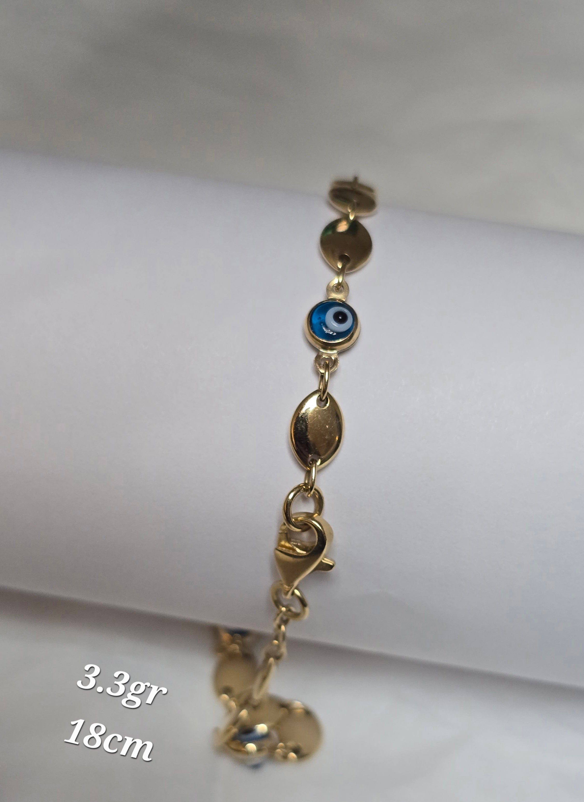 Turkish eye bracelet in 18karat Italian yellow gold, 18 cm, 3.3 grams